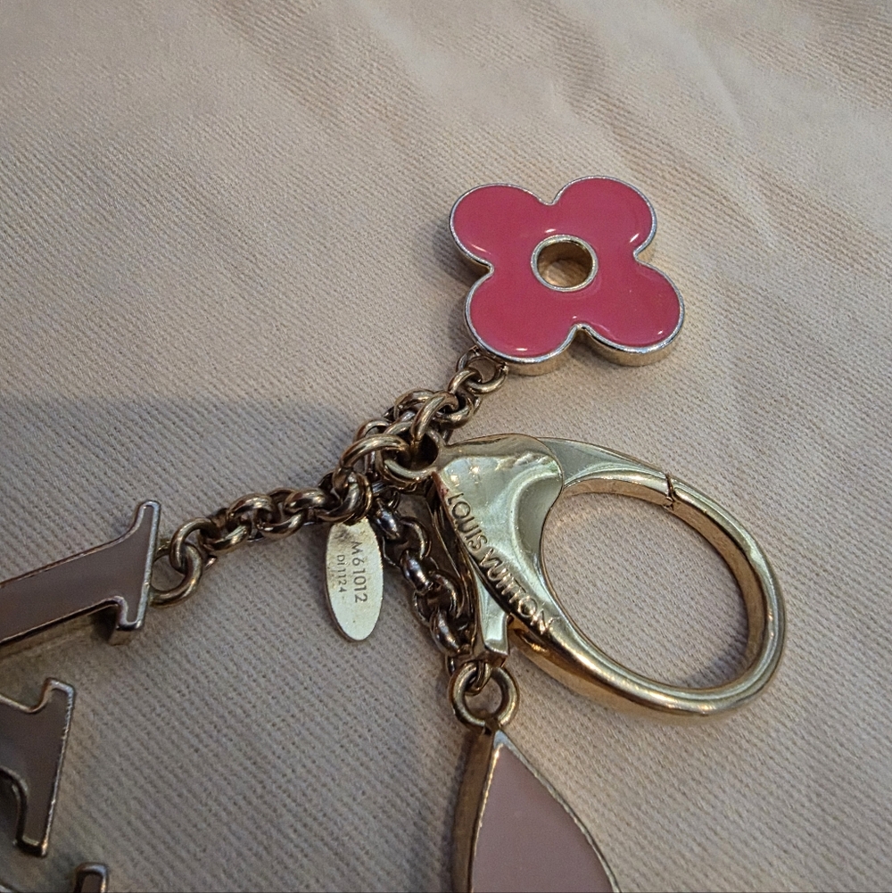 Authentic Louis Vuitton Floral Pink and Gold Key Holder a solid pink color - Picture 6 of 16